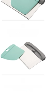 Detail of stainless steel dough cutter with PP handle and green scraper tool