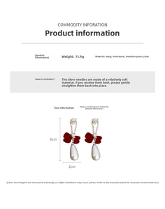 Detail showing red bow pearl drop earrings with rhinestones, size 6cm by 2cm, 11.9g weight