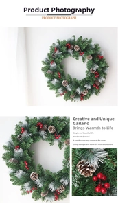 Detailed view of handmade Christmas wreath with red berries, pinecones and snowy pine needles