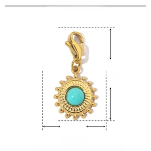 Detail of 25mm sun charm with turquoise inlay and dimensions in stainless steel