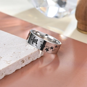 Silver stainless steel band ring featuring embossed sea turtle patterns for men and women