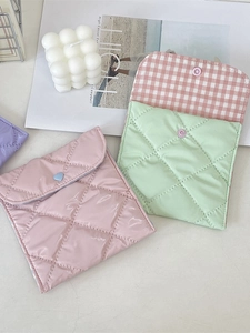 Ins style quilted pink and mint green sanitary storage bags with heart button detail