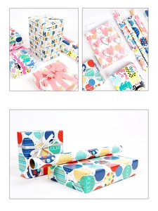 Detailed close-up of colorful cartoon gift wrapping paper with happy birthday patterns