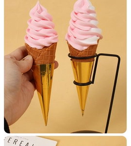 Detailed realistic soft ice cream props with waffle cone textures and golden foil wrap