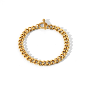 Golden stainless steel Cuban link bracelet with stylish OT toggle clasp on white background