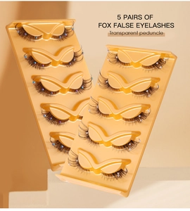 Detail of 5 pairs of fox style eyelashes with transparent bands and pearl bead accents