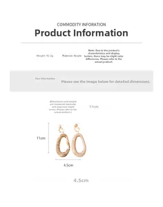 Detail of oversized acrylic oval earrings with brown marble texture and product dimensions
