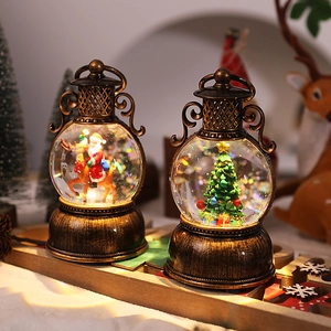 Detail of vintage Christmas lanterns with Santa Claus and warm glowing LED light