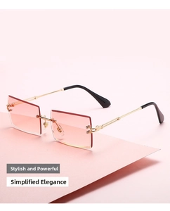 Detail of rimless square sunglasses with pink orange gradient lenses and gold temples