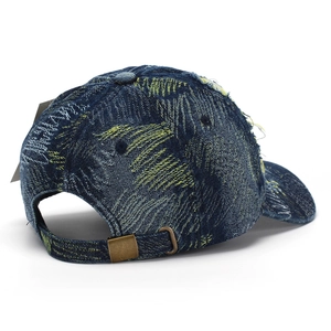 Distressed vintage denim baseball cap with yellow patterns and frayed details in back view