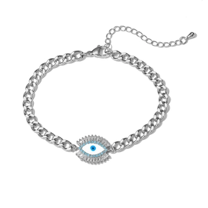 Silver Cuban chain bracelet featuring a zircon-studded evil eye charm on white background