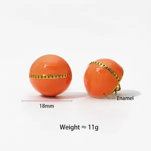 Fashionable round orange enamel ball earrings with golden chain detail and 18mm diameter