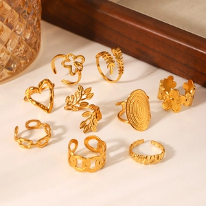 Set of 10 gold stainless steel rings featuring heart flower and leaf designs