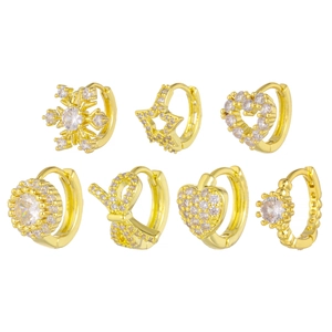 Golden earrings set with 7 styles including stars, hearts and snowflakes with zircon
