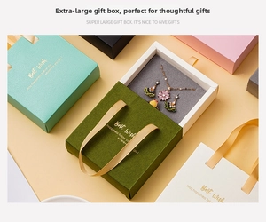 Variety of drawer-style jewelry gift boxes with ribbon handles and Best Wish gold foil