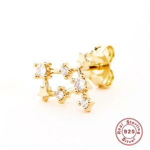 Macro shot of 925 sterling silver star cluster earrings with cubic zirconia stones