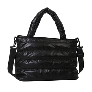 Sac seau matelassé noir en coton spatial avec bandoulière large et design bouffant
