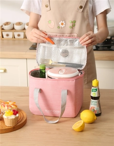 Pink insulated lunch bag with aluminum foil lining and interior mesh pocket for cutlery