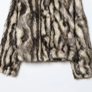 Black and white textured faux fur coat with realistic fox hair stripes pattern