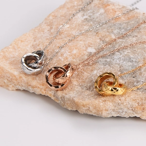 Elegant quilted pattern double-ring interlocking necklaces in silver, rose gold, and gold