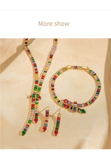 Luxurious gold plated necklace set featuring colorful baguette cut zircons on satin