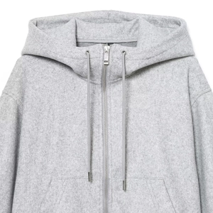 Women's light grey zip-up hoodie featuring puffy sleeves and soft fleece texture