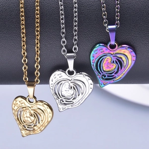Elegant 18k gold heart pendant necklace available in gold, silver, and rainbow steel