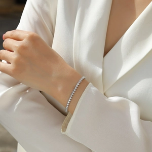 Classic silver S925 sterling silver tennis bracelet with moissanite stones on wrist