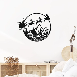 Detailed close-up of a black Christmas reindeer sleigh wall sticker in a living room
