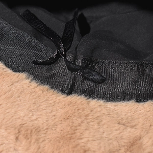 Winter plush bucket hat featuring soft camel faux fur and adjustable inner lining detail