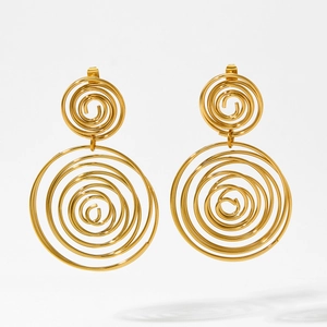 Exaggerated geometric gold spiral earrings in a tiered hollow design with high polish finish