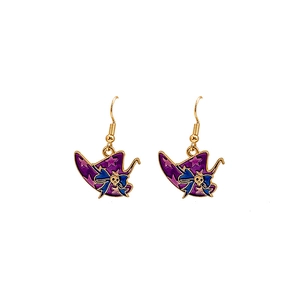 Detail of purple witch hat earrings with skull and gold star enamel decorations