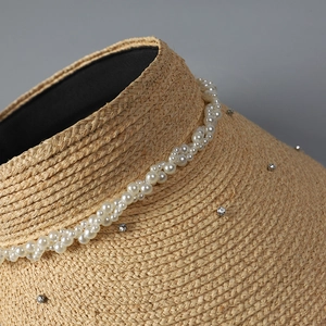 Chic beige straw visor hat with rhinestone and pearl trim for sun protection during beach vacations