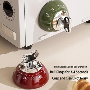 Retro mechanical kitchen timer in olive green and burgundy with clear minute markings