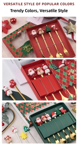 Detailed view of Christmas themed stainless steel spoon and fork set in holiday gift boxes