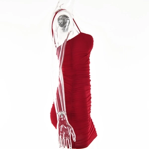 Side view of red V-neck bodycon mini dress with ruched detailing on a mannequin