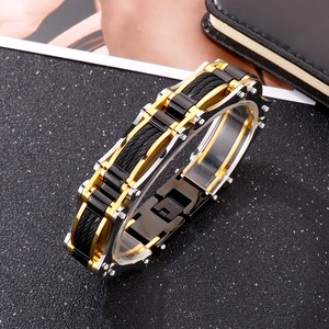 Bracelet homme en câble d'acier bicolore or, noir et argent au design industriel robuste