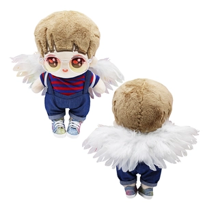 Front and back view of a plush doll wearing denim overalls and white feather wings