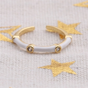 Minimalist gold plated open ring with white enamel finish and sparkling round cubic zirconia