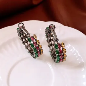 Vintage style round hoop earrings with colorful zircon stones in black gold finish