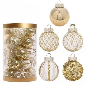 Set of 25 clear and gold painted PET Christmas ornaments in a cylinder storage box