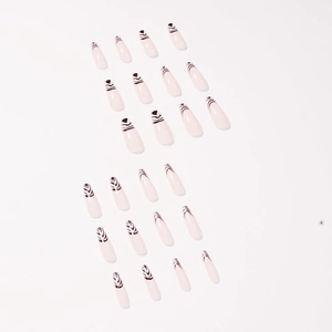 French almond fake nails set with black zebra stripes on creamy white base