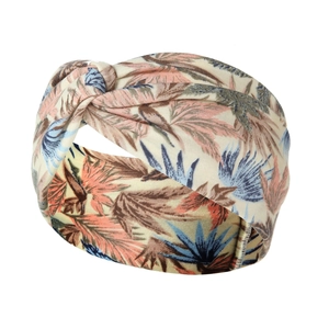Detailed view of the soft cotton yoga headband featuring a leaf print and top knot detail
