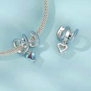 S925 sterling silver heart charm with blue star stones on a mesh bracelet