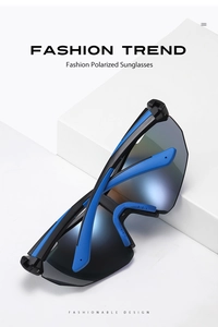 Detail view of polarized sports sunglasses with black frames and blue temple accents