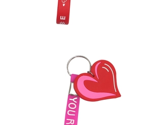 Detail of red heart-shaped silicone keychain with printed wrist strap for gift