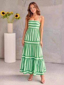 Green striped backless maxi dress with adjustable straps and tiered ruffle hemline