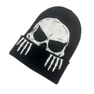 Detail view of the white skull and skeleton hand prints on black knit beanie hat