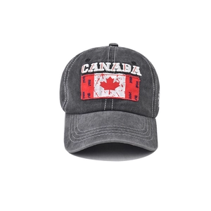 Close-up of Canada maple leaf embroidery on charcoal washed cotton baseball cap
