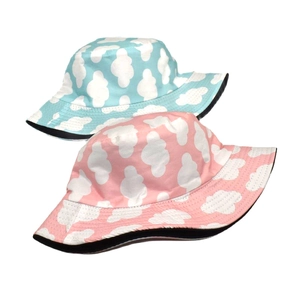 Blue and pink bucket hats with white cloud pattern for sun protection outdoors